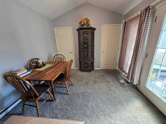 dining space with lofted ceiling, carpet, and a baseboard radiator