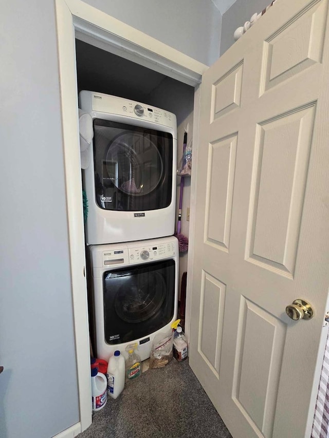 laundry room with laundry area and stacked washer and dryer