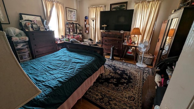 bedroom featuring wood-type flooring