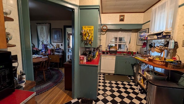 kitchen with white dishwasher and ornamental molding