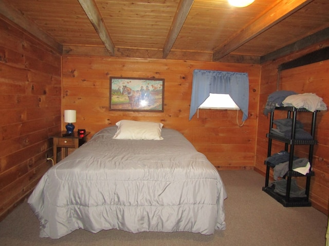 carpeted bedroom featuring beamed ceiling, wood walls, and wood ceiling