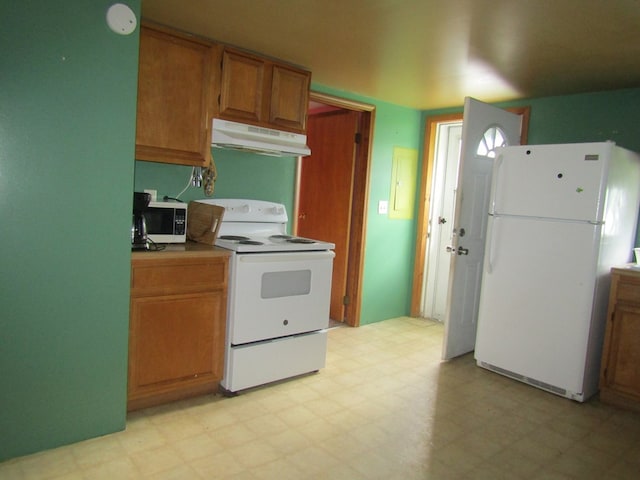 kitchen featuring white appliances