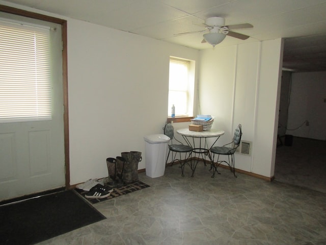 dining space with ceiling fan