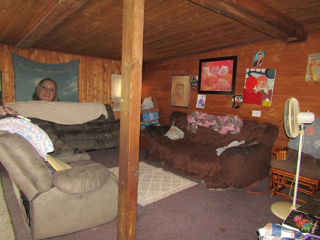 carpeted living room featuring beam ceiling, wooden walls, and wood ceiling