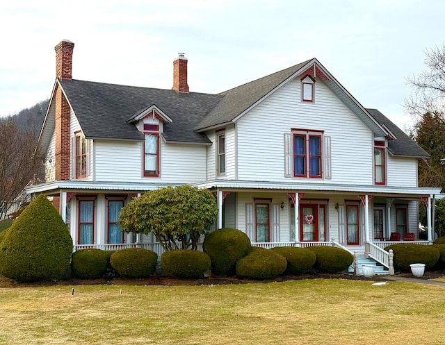 118 S Water St, Knoxville, PA 16928 - view of front of home featuring covered porch, a chimney, and a front lawn