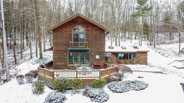 view of front of house with a wooden deck