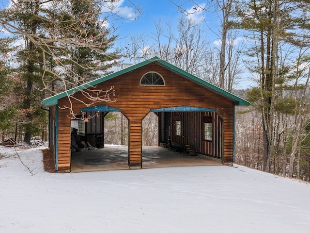 exterior space with a carport