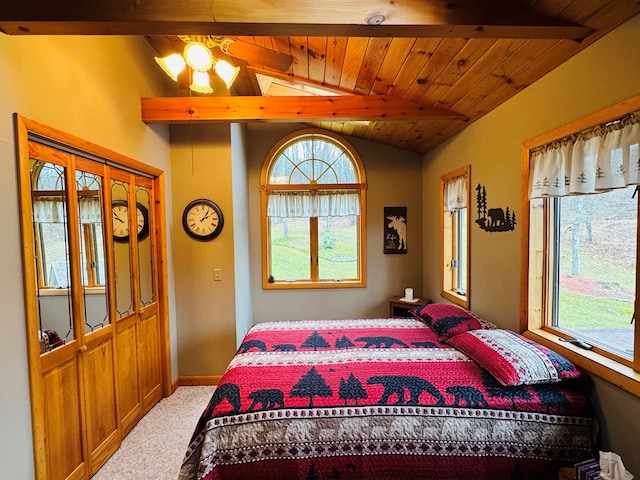 carpeted bedroom with wooden ceiling and lofted ceiling with beams