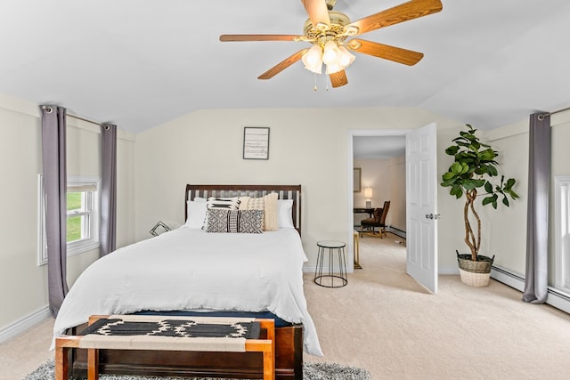 bedroom featuring baseboards, ceiling fan, light colored carpet, and vaulted ceiling