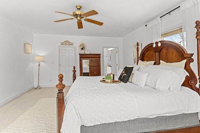 bedroom featuring light colored carpet, baseboards, and ceiling fan