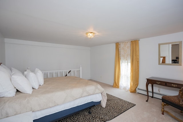 bedroom with light carpet and baseboard heating