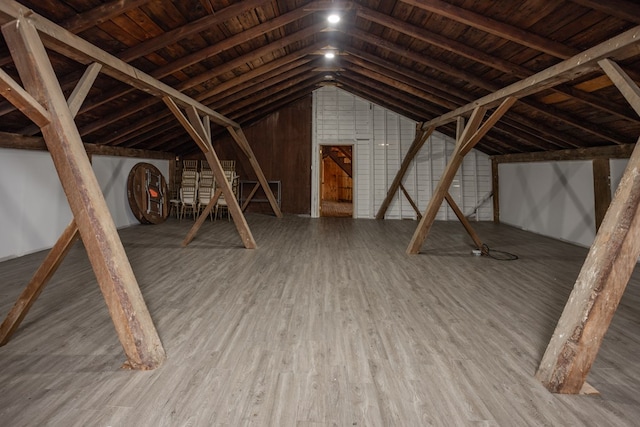 attic featuring an upstairs landing