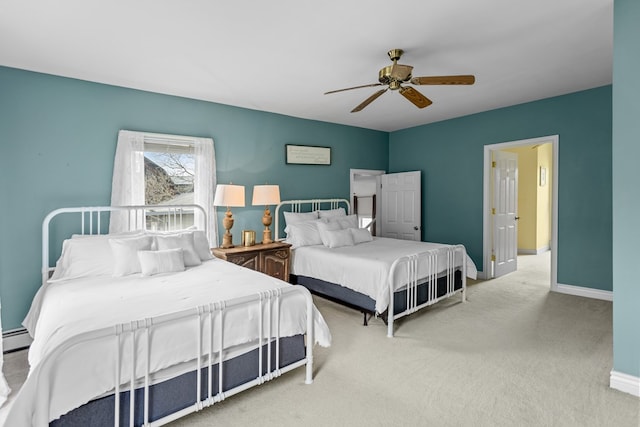 bedroom featuring a baseboard radiator, carpet flooring, baseboards, and ceiling fan