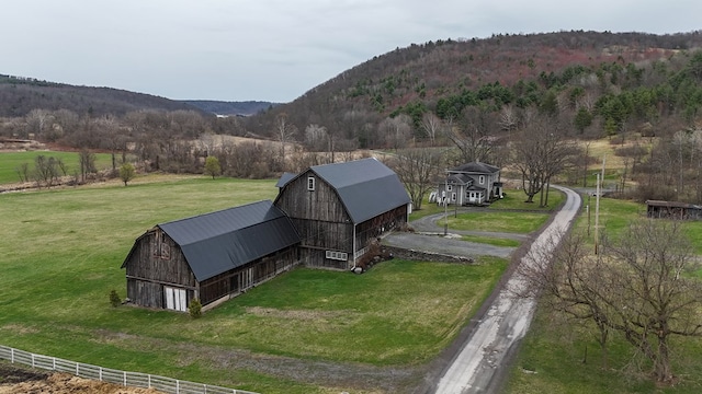 aerial view featuring a mountain view and a rural view