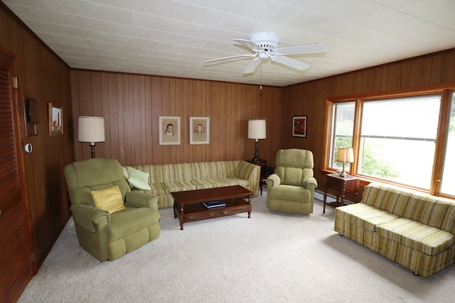 1 Mechanic St, Towanda, PA 18848 - carpeted living room with wood walls and a ceiling fan