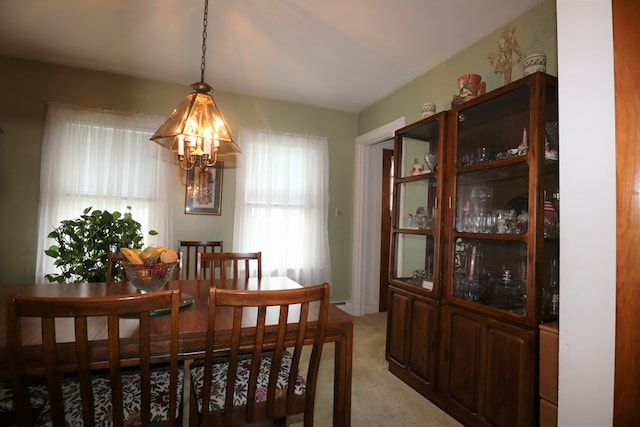 1 Mechanic St, Towanda, PA 18848 - dining room with light carpet and a chandelier
