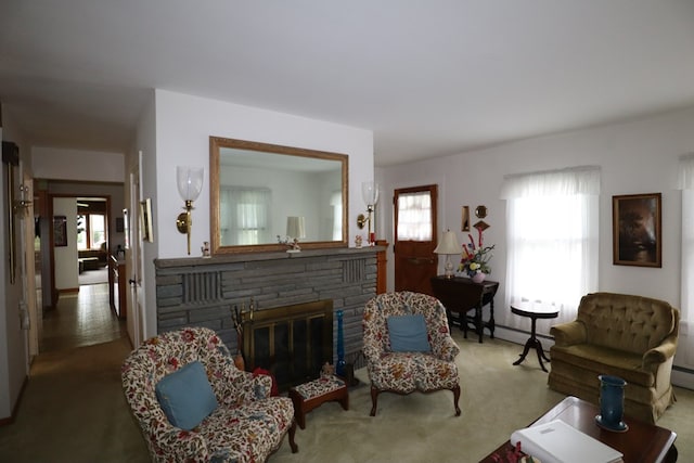 1 Mechanic St, Towanda, PA 18848 - carpeted living room featuring a fireplace, plenty of natural light, and baseboard heating