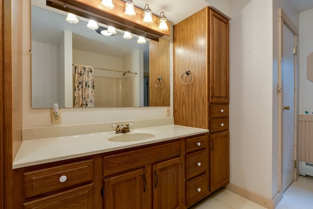 bathroom featuring vanity and a shower with shower curtain