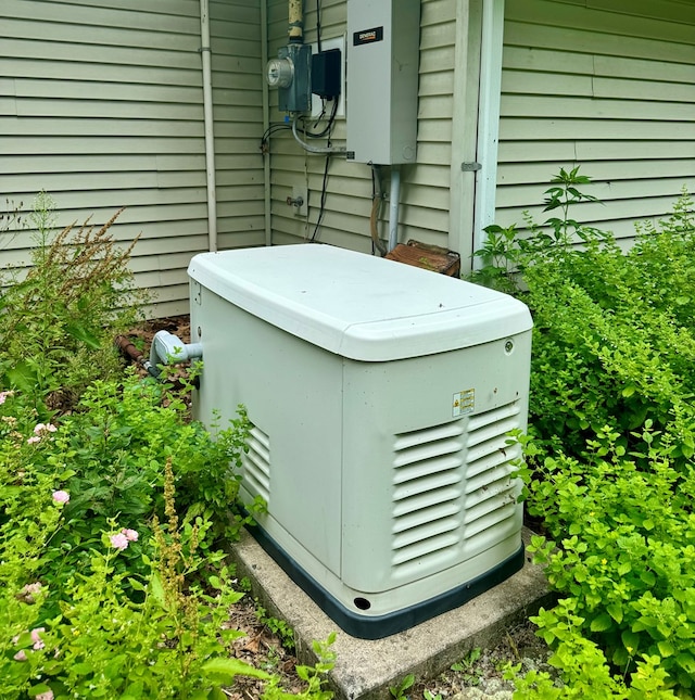 exterior details featuring a power unit and electric meter