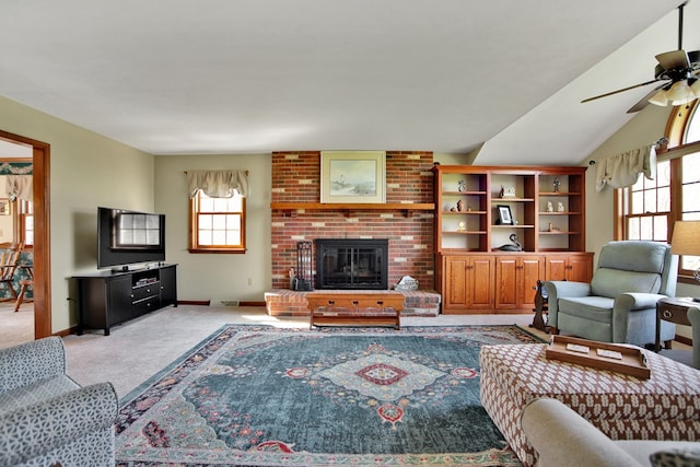 living room featuring a ceiling fan, carpet floors, baseboards, a brick fireplace, and visible vents