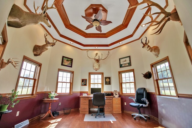 office area featuring recessed lighting, a high ceiling, wood finished floors, visible vents, and ornamental molding