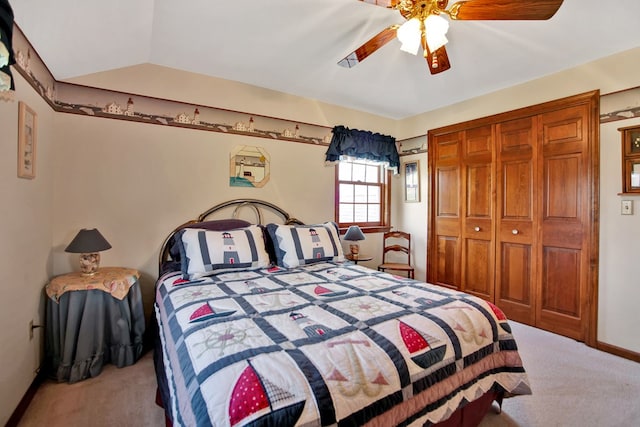 bedroom with ceiling fan, baseboards, a closet, and carpet