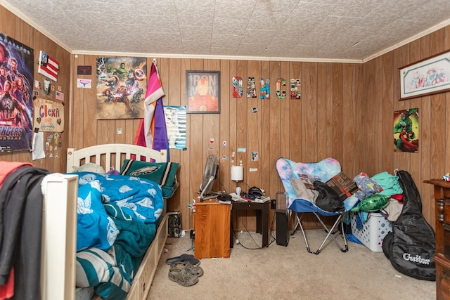 bedroom featuring carpet, ornamental molding, and wood walls