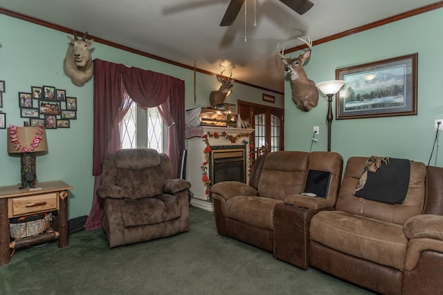 carpeted living room with ceiling fan, ornamental molding, and french doors