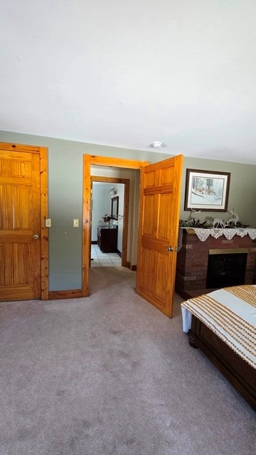 bedroom featuring light carpet