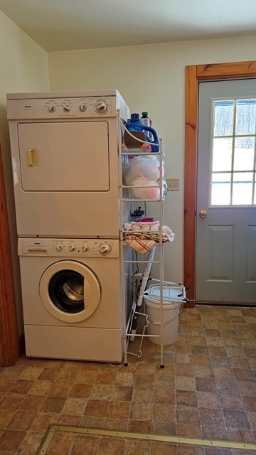 laundry room featuring stacked washer / dryer