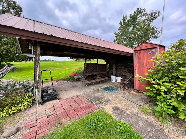 view of patio featuring an outdoor structure