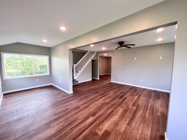 spare room featuring stairs, recessed lighting, dark wood finished floors, and baseboards