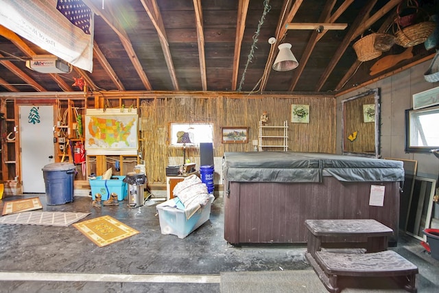 miscellaneous room featuring lofted ceiling