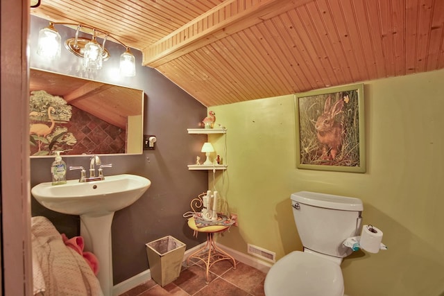 half bath featuring lofted ceiling, visible vents, toilet, wooden ceiling, and baseboards