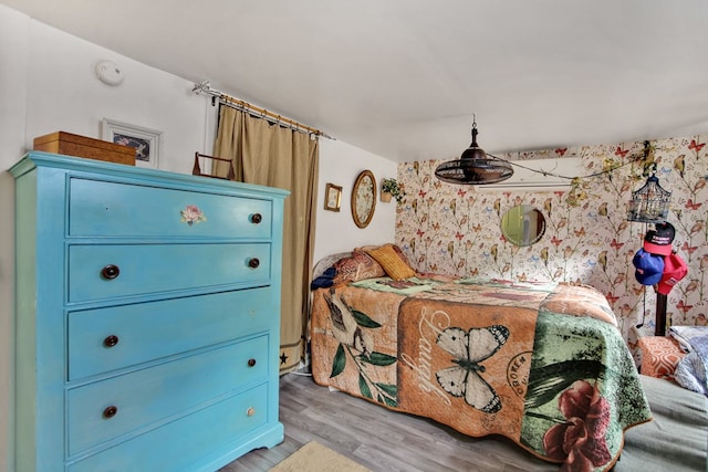 bedroom with light wood-style flooring