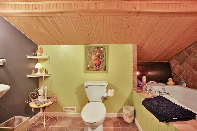 bathroom with visible vents, baseboards, wood ceiling, a garden tub, and tile patterned flooring