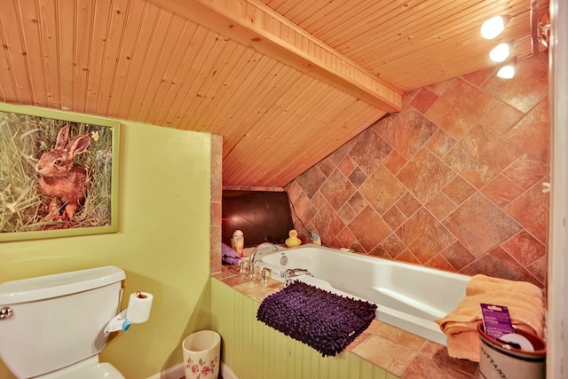 bathroom with toilet, wooden ceiling, tiled bath, and beamed ceiling