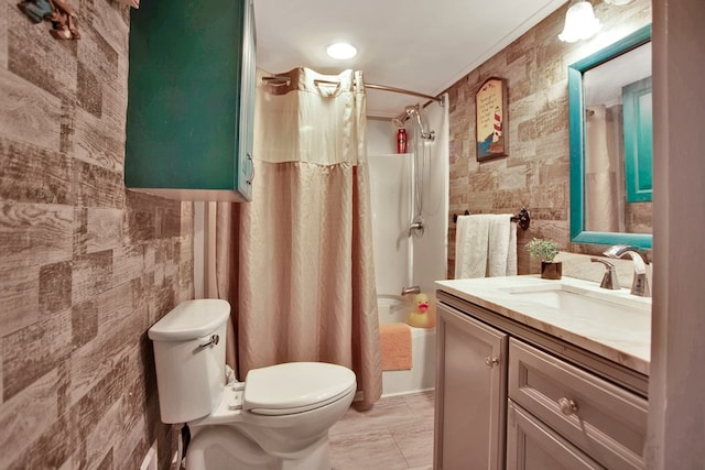 bathroom with toilet, curtained shower, vanity, and tile walls