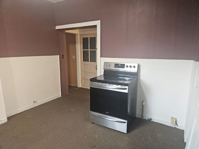 304 N Elmer Ave, Sayre, PA 18840 - kitchen with electric range and dark colored carpet