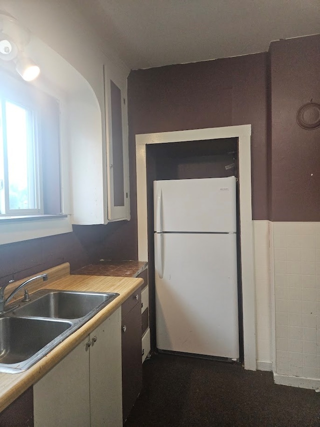 304 N Elmer Ave, Sayre, PA 18840 - kitchen featuring freestanding refrigerator and a sink