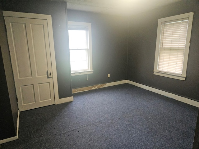 304 N Elmer Ave, Sayre, PA 18840 - unfurnished bedroom featuring carpet floors and baseboards