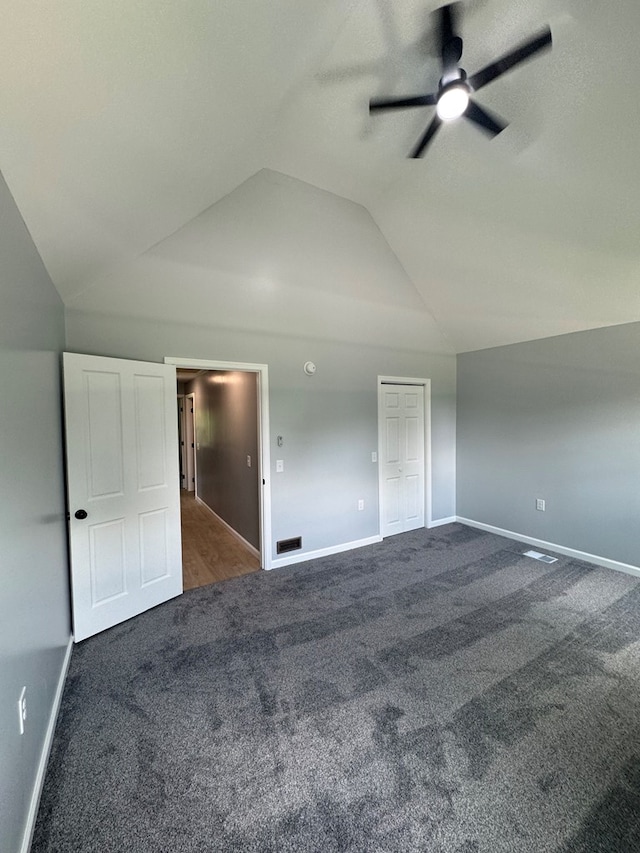 121 Park Pl, Waverly, NY 14892 - unfurnished bedroom with carpet floors, vaulted ceiling, and ceiling fan