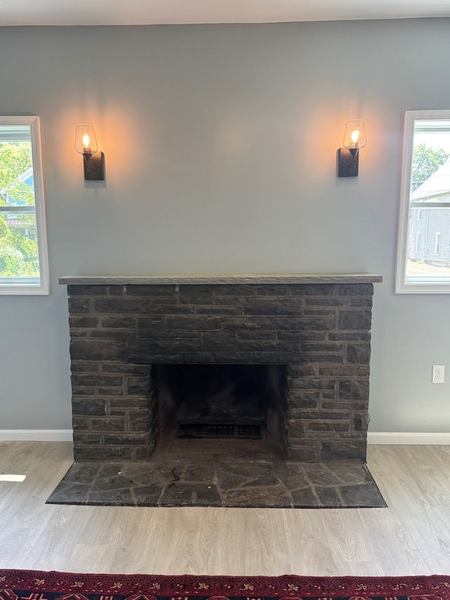 121 Park Pl, Waverly, NY 14892 - detailed view of a stone fireplace and wood finished floors