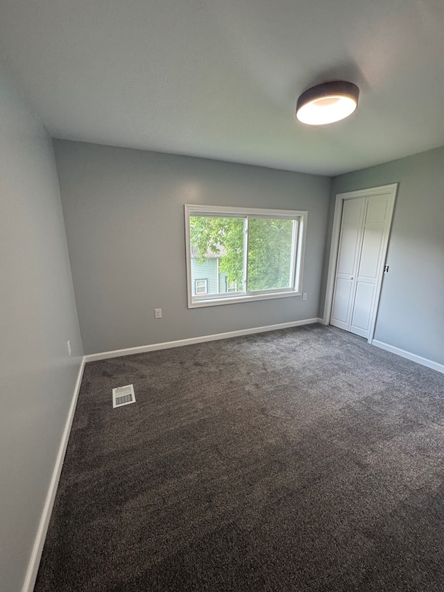 121 Park Pl, Waverly, NY 14892 - unfurnished bedroom with carpet and a closet