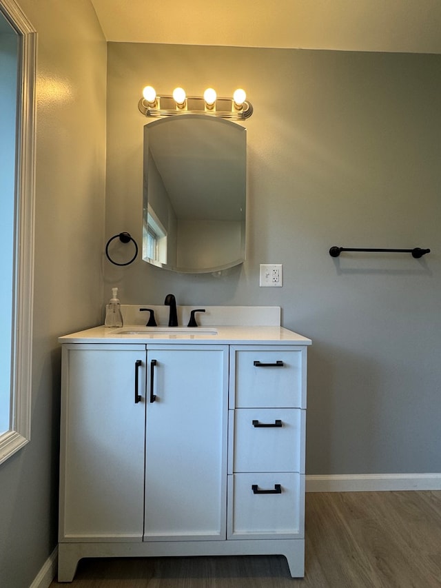 121 Park Pl, Waverly, NY 14892 - bathroom with vanity and wood finished floors