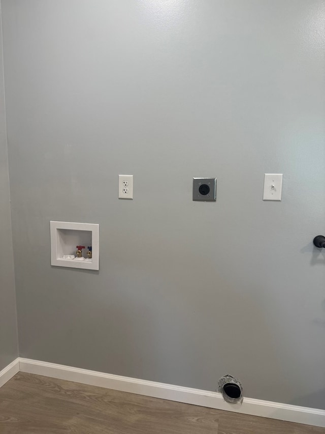121 Park Pl, Waverly, NY 14892 - laundry area with hookup for an electric dryer, hookup for a washing machine, and wood finished floors