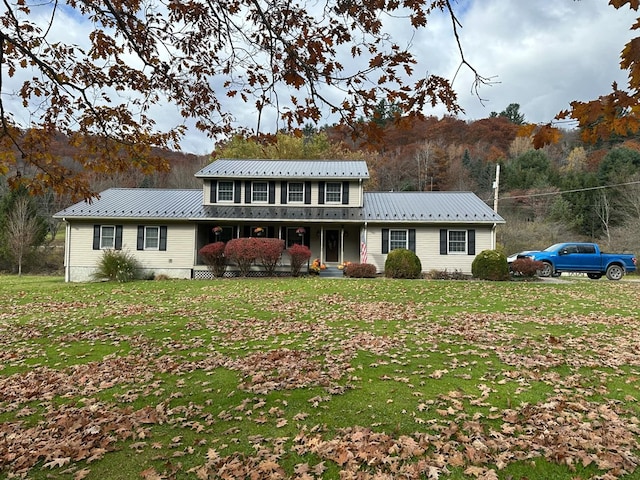 view of front facade with a front yard