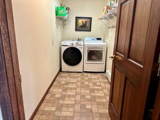 laundry room featuring separate washer and dryer and a baseboard heating unit