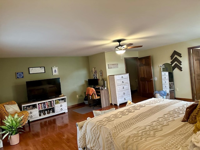 bedroom featuring ceiling fan and dark hardwood / wood-style flooring