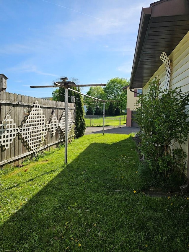 view of yard featuring fence